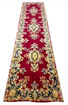 FINE PERSIAN KIRMAN RUNNER, 288cm x 75cm.