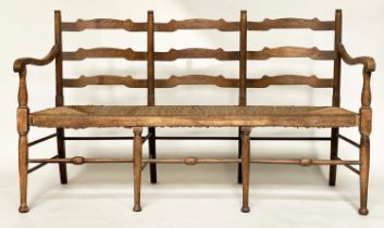 HALL BENCH, early 20th century English oak with ladder back and rush seat, 157cm W.