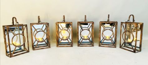 WALL HANGING CANDLE LANTERNS, a set of six, Art Deco style, mirrored backs, 43cm x 22cm x 11cm. (6)