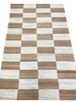 CONTEMPORARY NATURAL JUTE AND WOOL RUG, 244cm x 155cm.