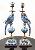 CANDELABRA, a pair, in the form of parrots, blue and white glazed ceramic, gilt mounts, 48.5cm H. (