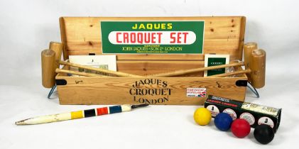 JAQUES CROQUET SET, comprising four clubs, balls, hoops, end post etc in a pine box.