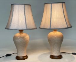 TABLE LAMPS, a pair, Chinese cream ceramic of baluster vase form with crackelure effect and silk