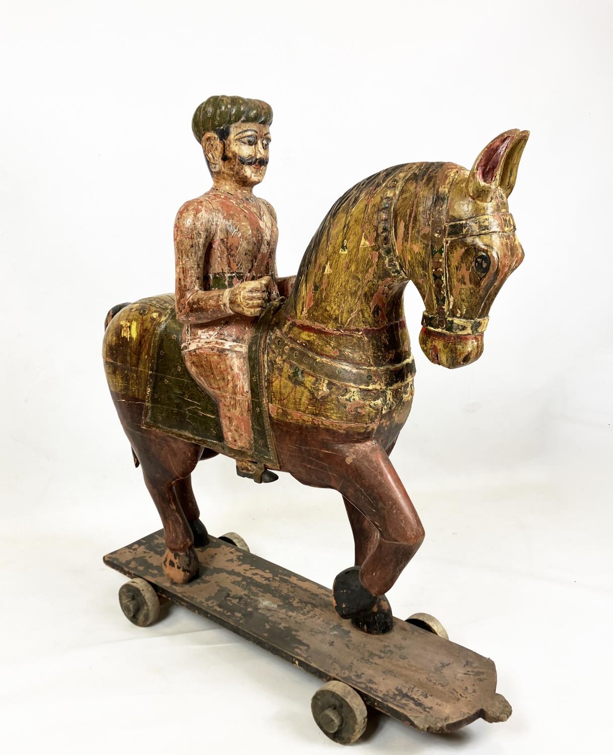 MUGHAL SCHOOL RAJASTHAN INDIA, 'Horse and rider', polychrome painted carved wood, 109cm H. - Image 2 of 6