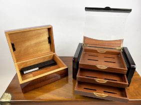 HUMIDORS, two, one Italian in Macassar with glass hinged lid and three trays, the other mahogany. (