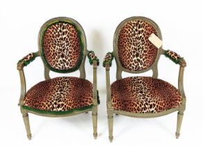 FAUTIEULS, a pair, each 60cm W x 92cm H, leopard print fabric with painted showframes. (2)