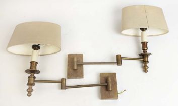 ATTRIBUTED TO CHARLES EDWARDS WALL LIGHTS, antiqued brass swing arm design with Porta Romana shades,