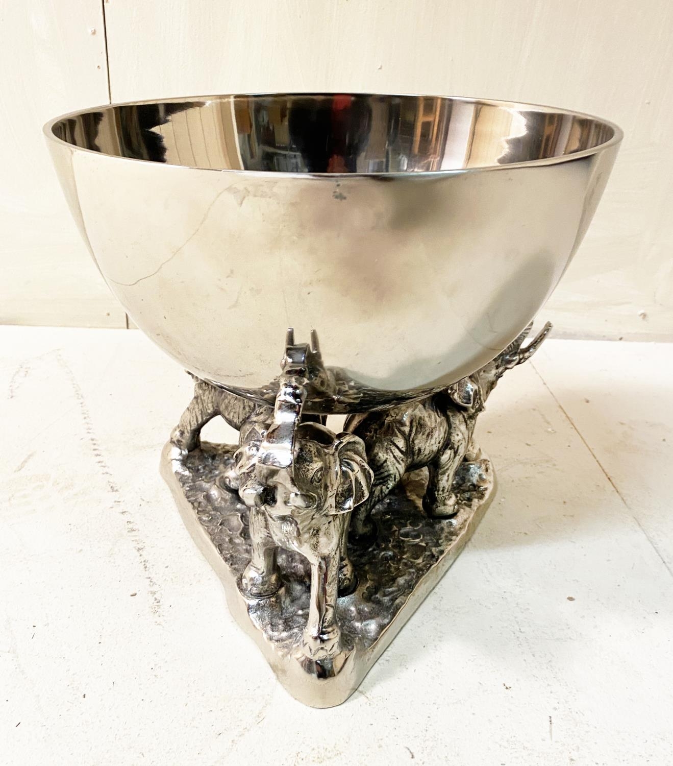 CHAMPAGNE BATH, 30cm high, 31cm diameter, the bowl raised on three elephant figures. - Image 3 of 5