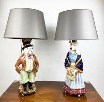 FIGURAL LAMPS, a pair, dog caricatures modelled as a country squire and a shawled lady in multi