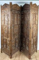 INDIAN STYLE FLOOR SCREEN, four fold, each panel 50cm W x 185cm H, carved and pierced hardwood.