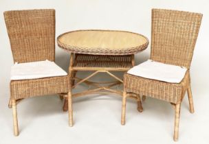 CONSERVATORY TABLE AND CHAIRS, a pair, rattan framed and cane panelled with seat cushions and an