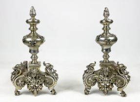 CHENETS, a pair, 19th century French bronze in silvered finish, House of Bourbons symbolic fleur