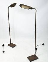 ARTEMIS DESIGN READING LAMPS, a pair, antique brass finish, 128cm H. (2)