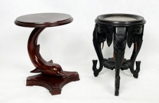 INDIAN LAMP TABLES, two, to include a 19th century ebonised elephant design base with a marble