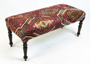 KILIM FOOTSTOOL, Anatolian kilim upholstered raised on turned supports, 43cm x 108cm x 50cm.