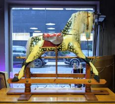ROCKING HORSE, 154cm W x 131cm H, traditional style, bears plaque 'The Rocking Horse Works with