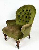 ARMCHAIR, Victorian button back green velvet with turned supports and front castors, 78cm H x 63cm