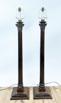 STANDARD LAMPS, a pair, each 138cm H, with fluted wooden columns and metal mounts.