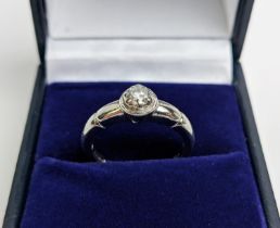 A 9CT WHITE GOLD DIAMOND SOLITAIRE RING, the diamond of approx. 0.25 carat, ring size L, complete