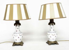 TABLE LAMPS, a pair, famille rose decorated Chinese ceramic, gilt metal mounted vase form with