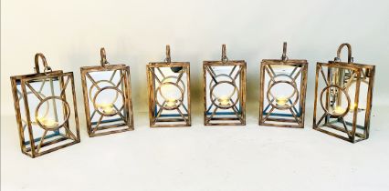 WALL HANGING CANDLE LANTERNS, a set of six, Art Deco style, mirrored backs, 43cm x 22cm x 11cm. (6)