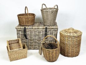 WICKER BASKETS, a collection of seven various to include a large lidded basket with leather
