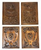 CARVED OAK PANELS, two pairs, neo-classical still life urns and shield cartouches with hanging