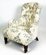 ARMCHAIR, Victorian button back upholstered with turned mahogany legs and ceramic front castors,