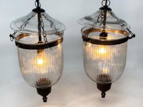 BELL JAR HALL LANTERNS, a pair, glass reeded tapering and bronze style mounted, 58cm H x 34cm W. (2)