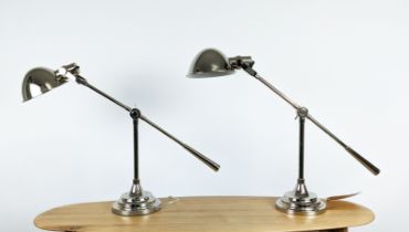 DESK LAMPS, a pair, Art Deco style design, 69cm at tallest, polished metal. (2)