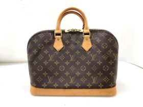 LOUIS VUITTON ALMA BAG, monogrammed coated canvas with top leather handles and leather base, top