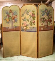 FLOOR SCREEN, three fold, walnut with still life design petit point panels, initialled and dated