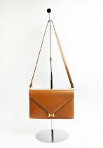 HERMÈS LYDIE BAG, gold tone hardware, leather lining, one zip pocket, one single patch pocket, one