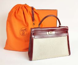 HERMÈS KELLY RETOURNE 32 TOILE/VEAU BOX, gold tone hardware, top handle, color matching leather