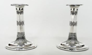 SILVER CANDLESTICKS, a pair, Victorian facetted columns palmette and reed decoration, oval base,