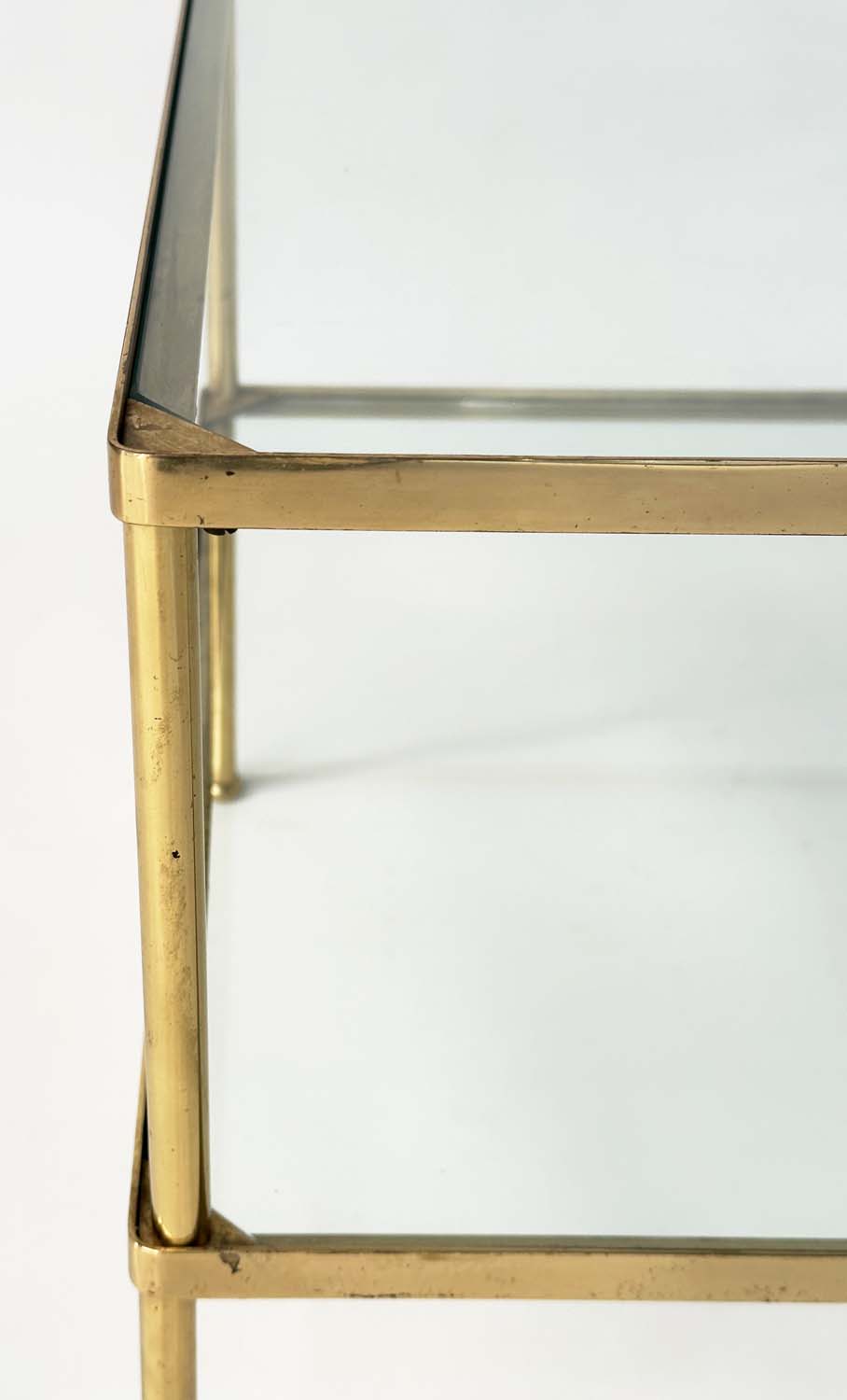 LAMP TABLES, a pair, 1970s, gilt metal, square with two glazed tiers and capped tubular supports, - Image 14 of 20