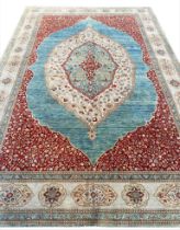 FINE TABRIZ HAJI-JALLILY CARPET, 279cm x 189cm.