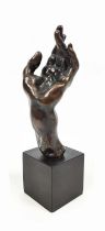 AUGUSTE RODIN (1840-1917), a patinated bronze sculpture modelled as a hand mounted on a black marble
