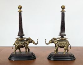 ELEPHANT OBLISKS, a pair, gilt metal on a stepped ebonised base, 52cm H. (2)