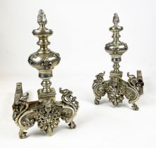 CHENETS, a pair, 19th century French bronze in silvered finish, House of Bourbons symbolic fleur