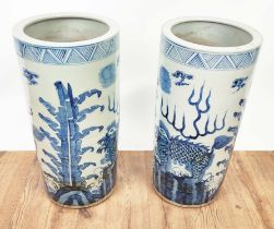 STICK STANDS, a pair, Chinese export style blue and white ceramic, 60cm H x 20cm diam approx. (2)