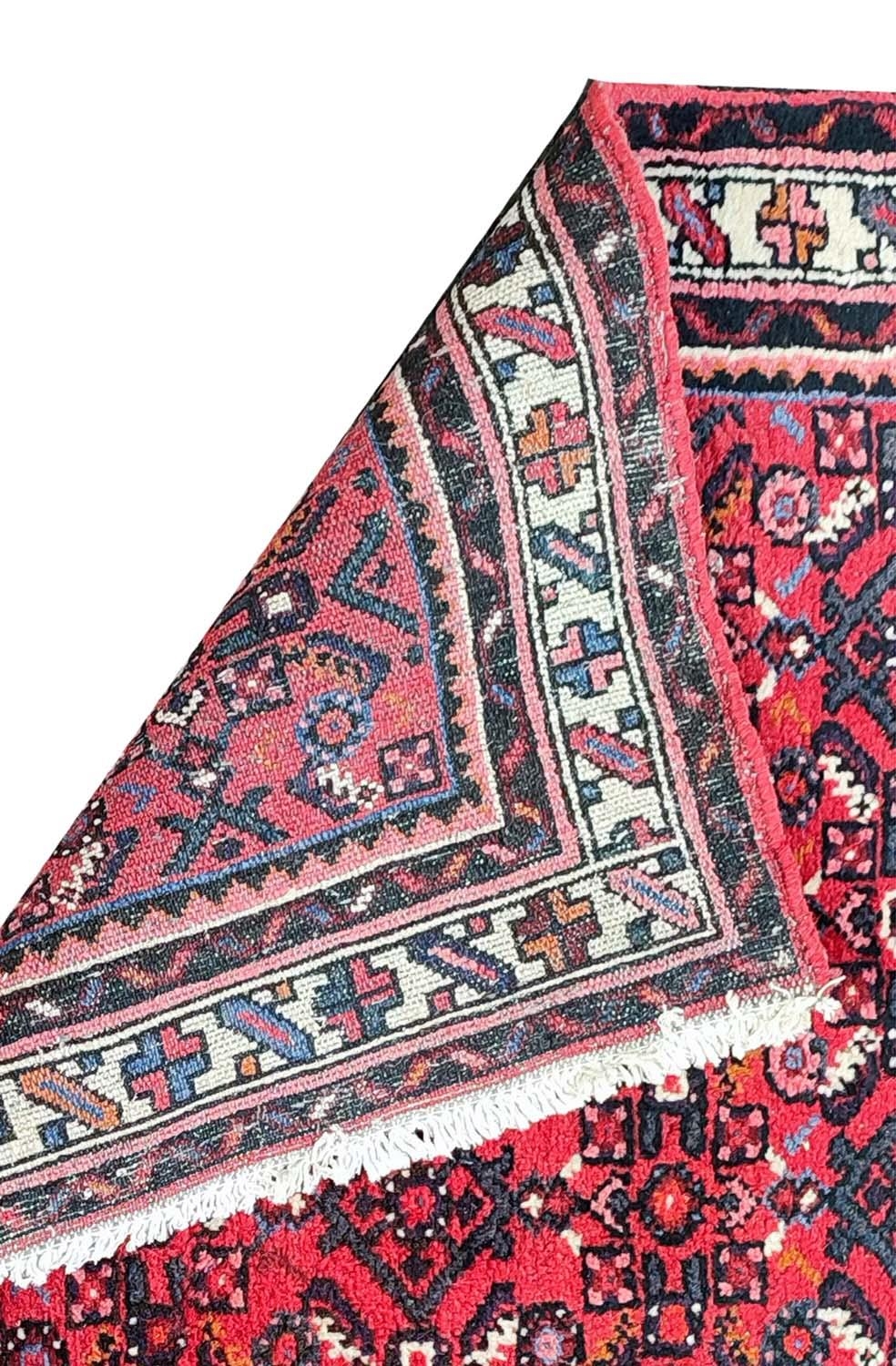 LARGE PERSIAN HOSSEINABAD CRIMSON GROUND RUNNER, 514cm L x 84cm W. - Image 9 of 14