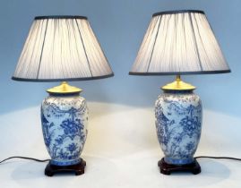 TABLE LAMPS, a pair, Chinese ceramic blue and white toile print, of vase form with wooden bases