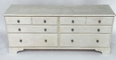 LOW CHEST, George III design traditionally grey painted with an arrangement of eight drawers and