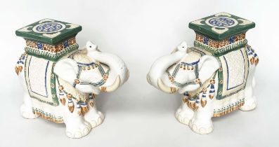 ELEPHANT STOOLS, a pair, Indian ceramic polychrome of elephants in ceremonial regalia with seats. (