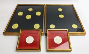 A COLLECTION OF PLASTER INTAGLIO PORTRAIT ROUNDELS, mounted and framed.
