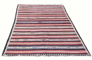 A QASHQAI STRIPED KELIM RUG, 335cm L x 175cm W.