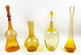 VASE AND BOTTLES, a group of four, amber glass two with stoppers, 70cm H. (4)