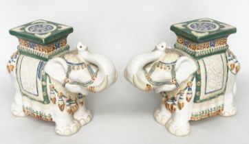 ELEPHANT STOOLS, a pair, Indian ceramic polychrome of elephants in ceremonial regalia with seats,