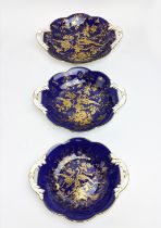 DISHES, a set of three graduated, Coalport, fine porcelain, deep-cobalt blue and gilded design, '